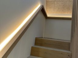 led in built in a oak hand rail 
